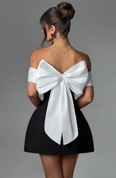 This oh-so-romantic, yet modern style is top of our wishlist. Make a statement in Delta, designed with a contrast bardot neckline that shows off your shoulders, and adorned with a dreamy bow detail to the back. In a playful mini length, the look is complete with a rounded, bubble shape skirt. 



Colour: Black/White.

Premium non-stretch crepe.

Fully lined.

Contrast bardot neckline.

Bow detail to back.

Rounded, bubble shape skirt.

Invisible zipper fastening.

Mini length.

 Size: XS, S, M, Bow Dress Aesthetic, Dresses With Bow, Back Bow Dress, Black And White Bow Dress, Black Dress With Bow, Black Mini Dress With Bow, Black And White Dress Outfit, Bow Dresses, Bow Dresses Women