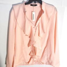 Chickme Cute N Classy Ruffled Peach Top. Boss Up In The Office Or Pair With Your Favorite Dress Pants For Cocktail Hour. The Thread On The Back Collar Pulled A Little Bit (See Above Photo). Excellent Condition Never Worn Feminine Long Sleeve Apricot Blouse, Feminine Peach Long Sleeve Blouse, Feminine Long Sleeve Peach Blouse, Elegant Summer Blouse In Apricot, Apricot Long Sleeve Blouse For Spring, Elegant Apricot Top For Summer, Elegant Apricot Tops For Summer, Elegant Apricot Summer Blouse, Elegant Peach Top For Summer