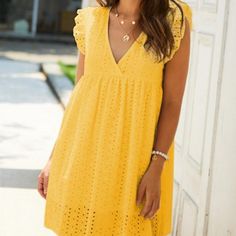 Shine Bright Like Sunshine With This Woven Smock Dress With Allover Eyelet Embroidery, A V-Neckline, Shoulder Straps With Ruffled Trim, And A Mini Length. Wear The Yellow Dress With Hoop Earrings And Espadrille Wedges For Relaxing At A Spa Resort. Color: Yellow Style: Cute Pattern Type: Plain Neckline: V Neck Dresses Length: Short Type: Smock Details: Garment Eyelets Sleeve Length: Cap Sleeve Season: Summer Composition: 35% Cotton, 65% Polyester Material: Cotton Blends Fabric: Non-Stretch Waist Short Sleeve Lace Dress, Airy Dress, Lace Summer Dresses, Vestido Casual, Romper Dress, Loose Dress, Lace Mini Dress, Outfit Casual, Middle Age