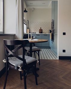 the kitchen is clean and ready to be used as a dining room or breakfast nook