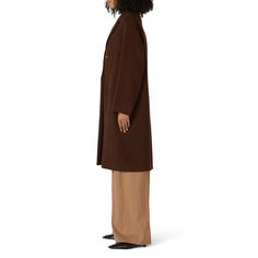 Brown wool (85% Virgin Wool, 25% Polyamide). Jacket. Long sleeves. Exposed front button closure. Pockets. 42" from shoulder to hemline. Imported. Oversized Brown Wool Coat For Work, Oversized Brown Wool Outerwear, Oversized Brown Outerwear With Notch Lapel, Brown Oversized Outerwear For Formal Events, Brown Oversized Outerwear For Formal Occasions, Tailored Single Breasted Outerwear For Daywear, Single Breasted Notch Lapel Outerwear For Daywear, Fall Daywear Blazer With Button Closure, Wool Outerwear With Buttons For Daywear