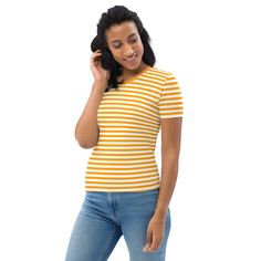 This Orange And White Striped Women's T-shirt is a trendy and stylish addition to any wardrobe. Made from a blend of 95% polyester and 5% elastane, it offers a comfortable and stretchy fit that hugs your curves in all the right places. The vibrant orange and white stripes add a pop of color to your outfit, making it perfect for both casual and dressier occasions. With its regular fit, this t-shirt is versatile and can be paired with jeans, shorts, or skirts for a chic and effortless look. Whether you're heading out for a day of shopping or meeting up with friends, this t-shirt is a must-have for any fashion-forward woman. See more striped clothing + FEATURES + 95% polyester, 5% elastane (fabric composition may vary by 1%) Premium knit mid-weight jersey Four-way stretch fabric that stretche Yellow Stretch Casual T-shirt, Casual Yellow Stretch T-shirt, Striped Stretch Short Sleeve T-shirt, Stretch Striped Short Sleeve T-shirt, Striped Stretch T-shirt With Short Sleeves, Fitted Striped Cotton T-shirt, Striped Stretch Cotton T-shirt, Fitted Striped Short Sleeve T-shirt, Stretch Cotton Orange T-shirt