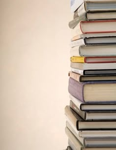 a stack of books sitting on top of each other