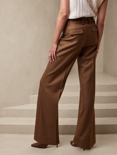 From boardroom to cocktail bar, this wide-leg trouser will have you feeling confident with an exquisitely tailored fit and a not-too-wide leg.  Crafted from a timeless all-season wool fabric from Italian mill Marzotto.  WIDE LEG FIT: High-waisted.  F Formal Wide Leg Pants For Fall, Business Casual Full-length Wide Leg Pants With Welt Pockets, Timeless Tailored Wide Leg Pants For Office, Chic Wide Leg Dress Pants For Business, Formal Wide Leg Dress Pants, Tailored Wide-leg Dress Pants For Fall, Timeless Wide Leg Office Pantsuit, Timeless Tailored Wide Leg Office Pants, Timeless Wide Leg Pantsuit For Office