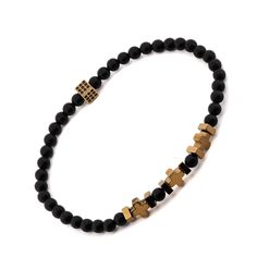 Elevate your style with the Black Onyx & Gold Hematite Beaded Bracelet, a sleek and sophisticated accessory designed for men. This elegant bracelet features 4mm black onyx stone beads, known for their grounding and protective qualities, adding a touch of timeless elegance and strength to your ensemble. Interspersed with the black onyx beads are shimmering gold hematite stone beads, creating a striking contrast that enhances the overall aesthetic of the bracelet. Whether you're dressing up for a Modern Black Hand-strung Bracelets, Modern Black Hand-strung Bracelet, Modern Black Hand-strung Beaded Bracelets, Modern Black Bracelets With Gemstone Beads, Beaded Bracelet For Men, Hematite Stone, June Birthstone Jewelry, Black Onyx Stone, Mens Beaded Bracelets