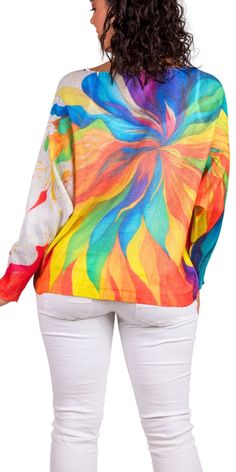 Batwing Long Sleeve Sweater Featuring a Multi-Color Floral Print. 65% Polyester, 35% Viscose One Size Fits Most Made in Italy Model 5'7" Multicolor Crew Neck Blouse With Relaxed Fit, Multicolor Print Long Sleeve Tops For Vacation, Multicolor Relaxed Fit Blouse For Fall, Multicolor Vacation Sweater For Spring, Vibrant Relaxed Fit Tops, Multicolor Crew Neck Blouse For Fall, Spring Beach Sweater In Multicolor, Multicolor Beach Sweater For Spring, Fall Multicolor Crew Neck Blouse