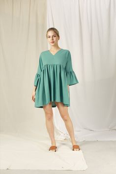 FOR THIS ITEM, WE NEED YOUR BUST, HEIGHT MEASUREMENTS SO WE CAN TAILOR THE DRESS TO FIT YOU BEST. HANDMADE ITEAM - perfect French seam - The model is 1m69 tall and wearing size S and Steel Blue Color ■ fit - OVERSIZE MINI LINEN DRESS WITH BELL SLEEVES - Has V - neck and two pockets inside ■ Sizing details and color - Please choose sizes carefully as we provided a very detailed sizing guide. - If you're not sure with sizing you can send us your information you want to get help before placing an order. - For complex custom request, we will charge an extra 50% of the item cost. - Please note that actual colors may slightly vary due to your computer resolution and monitor color settings. ■ Care instructions -With washing machine: In washing bag, please choose Cotton/ Linen washing option. Best Short Linen Dress, Linen Dress Short, Dress With Bell Sleeves, Dress For Summer, French Seam, Bell Sleeve Dress, Linen Dresses, Steel Blue, Dress Short