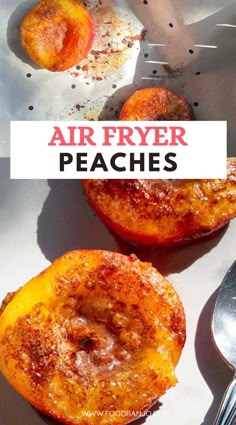 two pieces of fruit sitting on top of a pan with the words air fryer peaches