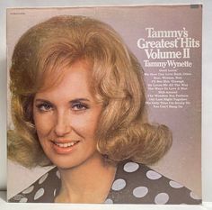 a woman with blonde hair and polka dot blouse on the cover of vanity's greatest hits volume ii