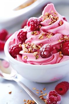 a white bowl filled with raspberry ice cream