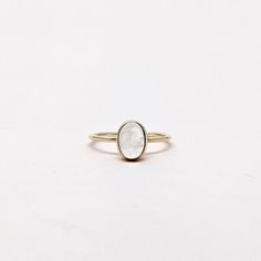 Natural Rainbow Moonstone Oval Cabochon Gemstone Stackable Ring. Semi Precious Gemstone Ring in 14k SOLID GOLD For Her from our Capsule Jewelry Collection.RainBow Moonstone is set in Bezel Setting in our Factory. Gold Ring AAA+ Quality. Perfect Gift For Everyday or June Birthstone Gift for Your Loved Ones. ►  DIMENSIONS : ◆ Gemstone : Rainbow Moonstone 0.60ct ◆ Stone size : 6*8 mm ◆ Shank Width : 1 mm      ◆  Material :  14k Yellow Gold      EACH Ring is Stamped With 585 Marked As 14k GOLD International Standard. All my gemstones are hand-selected for best quality assurance, then precisely sawed, and shaped into the desired geometry. The precious stones are then delicately grinned, sanded, and hand-polished to make sure each Ring has the perfect aesthetic. * Contact us For Resizing and Per Timeless Moonstone Promise Ring, Timeless White Jewelry With Rose Cut Diamonds, 14k Gold Moonstone Open Ring, Stackable Oval 14k Gold Jewelry, Heirloom Yellow Gold Moonstone Ring, Oval Cabochon, Heirloom Yellow Gold Oval Cabochon Moonstone Ring, Delicate Oval Ring With Rose Cut Diamonds, Heirloom Yellow Gold Moonstone Ring, Minimalist Oval Rose Cut Diamond Jewelry