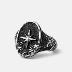 Adorned with an 8-point nautical star and crashing waves — let the Rocky Shores ring guide you on your journey to calmer waters. Handcrafted sterling silver. 8 Point Star Ring, Rings For Men Vintage, Mens Gothic Rings, Star Ring Men, Signet Ring Men Silver, Pirate Ring, Sea Rings, Water Ring, Pirate Jewelry