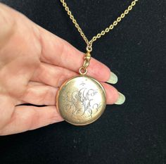 This gold-filled Victorian classic locket has a lovely engraved monogram (SJE?) on its exterior and an original photo shield and ring on its interior, ready for you to insert your own personal treasure. The 28" unique gold-filled chain is a perfect mate for the locket and includes an antique dog clip clasp so you could use the chain with any other pendant or locket in your collection! Bonus! (Note: this locket shows its Victorian roots with a few subtle dents; see pics.) Antique Locket, Dog Clip, Original Photo, Locket Necklace, Gold Filled Chain, Just For Fun, The Chain, Locket, Gold Filled