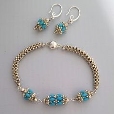 a bracelet and earring set with turquoise beads