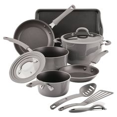 an assortment of pots and pans with utensils