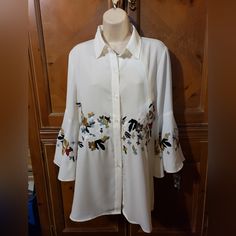 Ladies Womens Embroidered Blouse Top With Big Bell Sleeves. Ivory, Brand New With Tags, Perfect Unworn Condition, Size Medium. Tunic Style 20 Inches Across Armpit To Armpit. 30 Inches Long From High Shoulder. Chic Collared Blouse With Floral Embroidery, Embroidered White Shirt For Work, White Blouse With Embroidered Sleeves For Fall, Embroidered White Shirt For Workwear, White Embroidered Shirt For Workwear, Cream Collared Embroidered Top, Spring Workwear Blouse With Embroidered Sleeves, Cream Embroidered Collared Top, Embroidered Cream Button-up Top