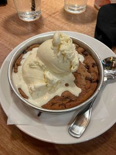 an ice cream sundae on a white plate