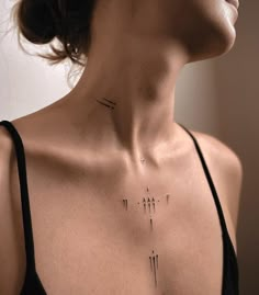 a woman's chest with arrows drawn on it