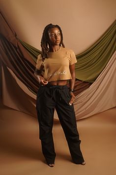 The Parachute Cargo Pant is the perfect pair to our Signature Cropped T-shirt. With 2 front and side pockets, drawstring waistband and additional belt loops, these pants are not only stylishly comfortable but super functional as well. Details: – Wide straight leg cargo pants– Elastic band with straps– Pockets on side– oversized fit – Model size 5′ 5″ wearing size S Parachute Cargo Pants, Straight Leg Cargo Pants, Parachute Cargo, Cropped T Shirt, Cargo Pant, Crop Tshirt, Drawstring Waistband, Combed Cotton, Elastic Band