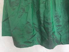 "Green Pleated Skirt Party Skirt, made out of shiny Satin Taffeta, with pink Taffeta lining. Size Small, measures about 30\" at the waist. From waist to hem, 26.25\". Also, please take a look at my storefront at: https://www.etsy.com/shop/FabFinds42?ref=seller-platform-mcnav I have a wide selection of one-of-a-kind items, from clothing and toys to home decor and gift items, and I add new things almost every day." Green Flowy Party Skirt, Green Solid Color Party Skirt, Green Full Ruffled Skirt, Green Voluminous Full Skirt, Green A-line Gathered Skirt, Green Pleated Skirt, Party Skirt, Green Skirt, Store Fronts