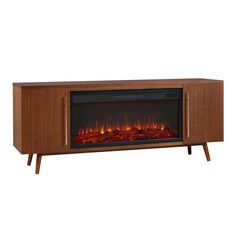 an entertainment center with a fireplace in the middle and flames on it's sides