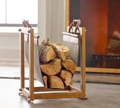 a stack of logs in a wooden holder