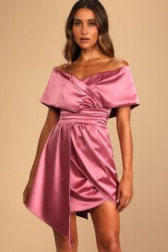 Lulus Exclusive! The party seems to follow the Lulus Always Celebrating Mauve Pink Satin Off-the-Shoulder Mini Dress! Sleek woven satin sweeps across an off-the-shoulder neckline (with hidden no-slip strips), a surplice bodice, and short sleeves. Gathered high waist sits above a mini skirt with an asymmetrical overlapping panel. Hidden back zipper/clasp. Fit: This garment fits true to size. Length: Mid-thigh. Size small measures 36" from top to bottom. Bust: Works best for A to C cup sizes. Wais Winter Wedding Guest Dress, Pink Satin Dress, Vibrant Dress, Lulus Dresses, C Cup, Mauve Pink, Cup Sizes, Satin Mini Dress, Lulu Dresses