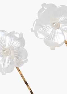 The Zia Bobby Pin Set, crafted in ethereal mother of pearl, is perfect for adding a dreamy touch to your look. The set features two bobby pins, each featuring an intricately carved mother of pearl flower, with a smaller central pearl. We love pulling a few strands back with the set, as it effortlessly adds a luminous touch that frames the face. Explore more bobby pins for styling inspiration. Pastel Edits, Luxury Hair Accessories, Styling Inspiration, Bobby Pin, Luxury Hair, Blue Bridesmaids, Pearl Flower, Fine Jewelry Gift, Something Blue