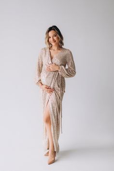 Shine like a star in this sparkly dress, radiating glamour and confidence. It's the ideal choice for events where you want to make a lasting impression. Expecting mothers can embrace both style and comfort with our fitted gold sparkly maternity dress. It offers a flattering fit without compromising on dazzling appeal. Celebrate the holiday season in style with our plus size gold sequin dress. It's designed to make curvy women feel fabulous and festive. Capture the holiday spirit with sophisticat Sequin Maternity Dress, Maternity Evening Gowns, Dress For Pregnant, Tulle Maternity Dress, Dress For Pregnant Women, Maternity Evening, Maternity Wrap Dress, Evening Wrap, Shine Like A Star