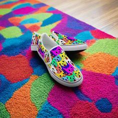 Unleash Fun and Comfort with Kids Colorful Cats Slip-on Sneakers!

Calling all young cat lovers and fashion enthusiasts! These vibrant slip-on sneakers are a must-have for any playful wardrobe. Featuring a lively canvas upper adorned with cheerful, cartoonish cat designs, these shoes are guaranteed to catch eyes and start conversations. Slip-on Low-top Sneakers With Speckled Midsole, Multicolor Low-top Slip-ons With Rubber Sole, White Sole Slip-on Low-top Custom Sneakers, Casual High-top Slip-on Sneakers With Studded Outsoles, Flat Slip-on Sneakers With Rubber Sole For Streetwear, Multicolor Slip-on Skate Shoes For Streetwear, Casual Multicolor Slip-on Sneakers For Streetwear, Multicolor Sneakers For Skateboarding, Multicolor Sneakers With Rubber Sole For Skateboarding