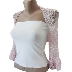 This Pale Pink Ruffle Sleeves Bolero is a perfect accessory for your summer outfit. It gives an elegant silky touch and is proper for the late spring and the summer months. Be the star at the dancing with this lightweight loose shrug. It matches perfectly with an evening dress as well over a party top.   This bolero is quite stretchy. Ask for a Custom order to fit exactly your size ot choose it according to the measures given below. It is available in Plus size also. Please contact us to send us Spring Party Lace Shrug, Spring Party Crochet Top, Fitted Long Sleeve Crochet Party Top, Fitted Long Sleeve Crochet Top For Party, Feminine Crochet Top For Spring Party, Fitted Crochet Shrug For Summer, Elegant Crochet Top For Wedding, Long Sleeve Summer Shrug For Party, Spring Party Lace Crochet Top