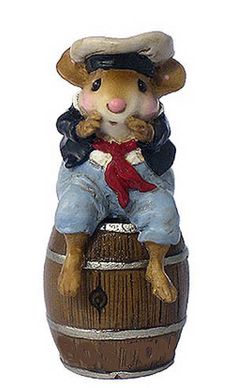 a figurine of a mouse sitting on top of a barrel that says boston