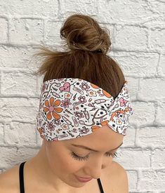 white twist headband with orange and pink medical theme print and flowers Trendy Stretch Headband With Elastic Band, White Elastic Headband For Summer, Trendy Cotton Sweatband Headband, Trendy Stretch Bandeau Headband, Casual Cotton Headband With Elastic Band, Casual Cotton Sweatband Headband For Summer, Casual Stretch Cotton Sweatband Headband, Trendy Elastic Headband, Trendy Bandana With Matching Headband For Spring