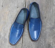 New Handmade Blue Leather Loafers Shoes For Men's    Brand Leather Edges  Running Size USA Size   Features Handmade Hand Stitched  Material Leather  Leather Sole  Color Blue  Interior Soft Leather Lining  Pattern Solid Dress Shoes  Product Line Made In Pakistan  Style Dress Stylish moccasin Penny... Classic Blue Slip-ons For Business, Blue Leather Sole Slip-on Moccasins, Business Blue Loafers With Rubber Sole, Blue Business Loafers With Rubber Sole, Blue Slip-on Moccasins, Blue Slip-on Moccasins For Business, Blue Slip-on Business Moccasins, Blue Formal Slip-ons With Leather Sole, Formal Blue Slip-ons With Leather Sole