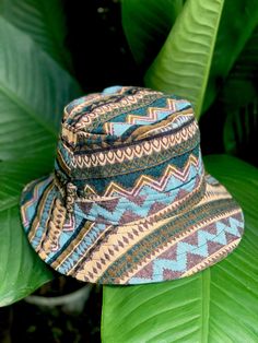 Artisan Bucket Hat | Boho-inspired bucket hat featuring a woven design with mixed patterns This Bucket Hat is made from 100% natural organic cotton ,        Hat is unisex fit great on both men and women Measurements  Large - inner circumference is 24" inches Brim 2" **These hats are handmade and so will vary slightly Blue Bucket Hat With Curved Brim For Festivals, Blue Bucket Hat With Short Brim For Festivals, Blue Short Brim Bucket Hat For Festivals, Brown Bucket Hat For Festival, Blue Curved Brim Bucket Hat For Festival, Blue Wide Brim Bucket Hat For Festivals, Brown Bucket Hat For Festival, One Size, Blue Brimmed Bucket Hat For Festival, Blue Cotton Festival Hat