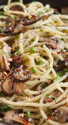 pasta with mushrooms and green peppers in a pan