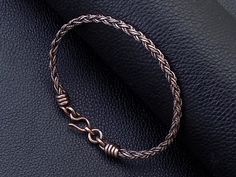 "Braided twisted wire wrapped copper men cuff bracelet , casual daily men cuff wristband. Bracelet width : 0.6 cm - 0,25 \" Copper is oxidized to give it an antique appearance. Please read about copper care on Info & Faq section. The requested piece it's made to order similar with the original shown item so may show some small differences ,but I always do my best for a similar look . Please be sure to read the entire description of the item before you purchase. Item images may seem larger due to Viking Costume Ideas, Bracelet For Man, Metal Men, Viking Costume, Celtic Viking, Minimalist Men, Birthday Gift For Dad, Bike Pic, Modern Men