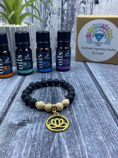 * When wearing your diffusing Bracelet, YOU are receiving the healing prosperities of the natural gemstone and balancing energy from the lava stones. 🖤✨ Creating handmade unique meaningful jewelry pieces designed to inspire you! Visit my shop  https://create2inspireone.etsy.com 🌟Details & Material: * Aromatherapy Diffuser Bracelet  *Elastic Cord (Adjustable to your wrist)  *Lava Rocks  *Gold Spacers  *bamboo beads  *Jump rings  *Lotus Flower Charm  *Jewelry box to keep your bracelet safe *essential oils included (3 mini bottles)  *Rub 1-2 drops of essential oil's on the lava stones, Re-apply same or different essential oil when aroma fades. ** ANY essential oil you like** personal preference  The pictures above are my personal favorites ~ Have fun with it- use any kind of essential oil's Bohemian Lava Stone Bracelets For Gift, Bohemian Lava Stone Bracelet As Gift, Spiritual Lava Stone Stretch Bracelet Gift, Bohemian Lava Stone Beaded Bracelets Gift, Bohemian Lava Stone Beaded Bracelet Gift, Holistic Beaded Stretch Bracelet As Gift, Adjustable Lava Stone Stretch Bracelet Gift, Rock Bracelets, Bamboo Beads