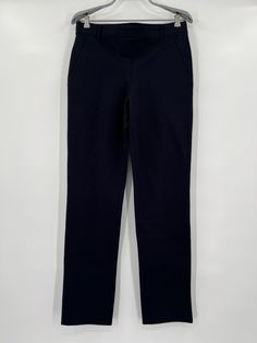 Quince Women's Ultra-Stretch Ponte Straight Leg Pants - New with tags Color: Black Size: Medium Petite - 28" Inseam 67% rayon, 28% nylon, 5% spandex 4-way stretch Wrinkle-resistant Faux front and back pockets Pull-on style with flat elasticized waistband and belt loops Measurements 15.5" Waist, laying flat 17" Hip, laying flat 10.5" Rise 28" Inseam Stretch Work Trousers For Business Casual, Stretch Trousers For Business Casual, Stretch Business Casual Work Trousers, Straight Leg Workwear Leggings With Pockets, Straight Leg Leggings With Pockets For Workwear, Stretch Elastane Straight Leg Chinos, Fitted Workwear Leggings With Pockets, Fitted Straight Leg Leggings With Pockets, Solid Stretch Work Pants With Tapered Leg