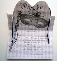 a masquerade wedding card with a mask on it