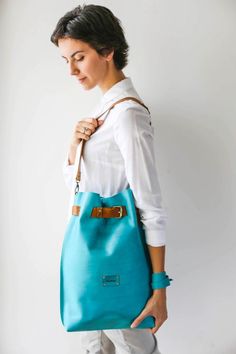 Large Leather Backpack Leather Laptop Backpack Blue | Etsy Modern Turquoise Bag For Everyday Use, Turquoise Leather Everyday Shoulder Bag, Turquoise Leather Shoulder Bag For Travel, Turquoise Shoulder Bag For Everyday Use, Luxury Blue Hobo Bag For Travel, Leather Shoulder Bag In Turquoise For Everyday Use, Turquoise Bags With Leather Handles For Everyday Use, Modern Blue Satchel Hobo Bag, Turquoise Bag With Detachable Strap For Everyday Use