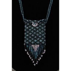 Artisan Jewelry Beaded WICCA Amulet Bag Aqua Blue Pattern Necklace Liz Schwartz. Hand crafted one of a kind piece. 26" long strap.  The pouch is 2.5" by 2" and the fringe is 2" long. Woven seed glass beads. Long flap in the front.  Be an original. Great for a water witch. Handmade Beaded Necklaces With Round Beads For Everyday, Bohemian Rectangular Necklaces For Everyday Use, Bohemian Rectangular Necklace For Everyday Use, Bohemian Rectangular Necklace, Everyday Rectangular Bohemian Necklace, Rectangular Beaded Necklace With Large Beads For Gifts, Everyday Round Beaded Necklaces With Lobster Clasp, Everyday Beaded Necklaces, Adjustable Rectangular Necklaces For Everyday Use