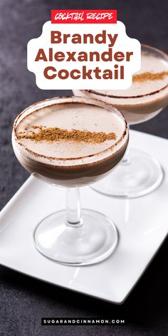 two glasses filled with drinks sitting on top of a white plate next to each other