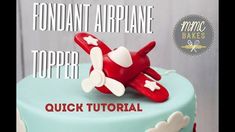 a cake with fondant airplane topper on it and the words, quick tutor