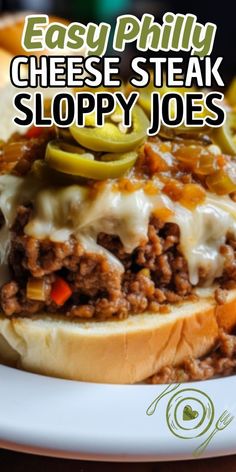 an easy philly cheese steak sloppy joes sandwich on a plate with pickles