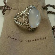 Absolutely Stunning Dy Moonstone Ring With 2 Rows Of Brilliant Round Diamonds!! Set In Sterling Silver, Split Shank. Gorgeous Rare And Retired Statement Ring! Few Surface Scratches Noted. Ring Is Mother Of Pearl Color Which Picks Up Surrounding Colors, Hence Its Name "Moonstone." Dy Pouch Included. Free Pm Authentication Service And Free Shipping, So Buy With Confidence! Luxury Sterling Silver Oval Cabochon Moonstone Ring, Oval Multi-stone Moonstone Ring In Sterling Silver, David Yurman Prasiolite Ring, David Yurman Jewelry Reeds Jewelers, Bohemian Sterling Silver Oval Cabochon Moonstone Ring, David Yurman Jewelry, Split Shank, David Yurman, Moonstone Ring