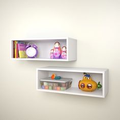 two white shelves with toys on them against a wall