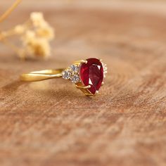 Natural Red ruby ring for women, Red rose ruby ring for her, Engagement ring, Wedding ring, Purpose ring, Promise ring, Statement ring, Gift for her. *Other Similar Jewelry Available Here* https://www.etsy.com/shop/AreebaJewelry Details:- Gemstone - Red Stone Color Available - Natural Red Stone Setting - Prong Quality - AAA Grade Stone Size - 5 x 7 MM Rize Size - 5 US TO 9 US Available Type - 100% Natural  Shipping service - Free worldwide shipping service About AreebaJewelry:- AreebaJewelry tak Elegant Red Ruby Open Ring, Lab-created Ruby Birthstone Diamond Ring For Promise, Lab-created Ruby Birthstone Diamond Promise Ring, Lab-created Ruby Diamond Promise Ring With Birthstone, Pear-shaped Promise Rings For Valentine's Day, Red Solitaire Ruby Ring As A Gift, Gift Red Ruby Ring With Prong Setting, Elegant Ruby Cluster Ring With Birthstone, Lab-created Ruby Birthstone Promise Ring