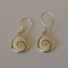 Handmade 925 Sterling silver and shiva eye shell earring.  Measurements: 20mm.x15mm.wide.