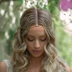 Delicate two row headpiece features an Italian chain and pave crystals that dangle beautifully alongside your head. This headpiece is the perfect addition to your bohemian bridal look and looks great styled with fluffed-up, flirty waves. This headpiece is custom made to fit true to your size. Please send your measurements & refer to our Fit Guide as a reference. 14K Gold over Sterling Silver Italian Lace Chain, 1.5mm Cubic Zirconia crystals: 4mm Hypoallergenic, lead and nickel free Handcrafted i Jewelled Headpiece, Bride Head, Beaded Headpiece, Chain Headpiece, Boho Headpiece, Italian Chain, Gold Headpiece, Hair Chains, Bride Headpiece